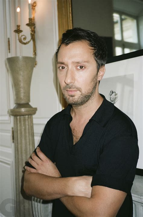 anthony vaccarello bicep tattoo.